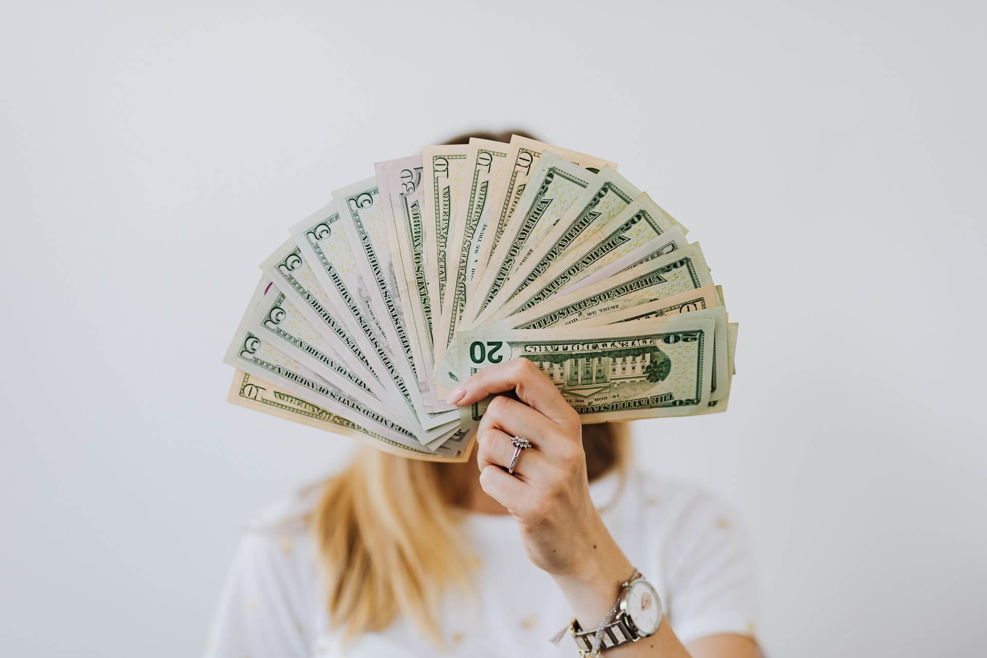 woman holding money