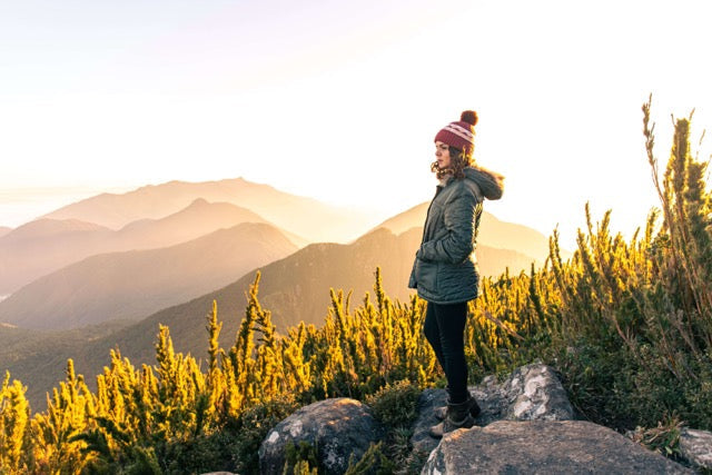 woman hiking with view