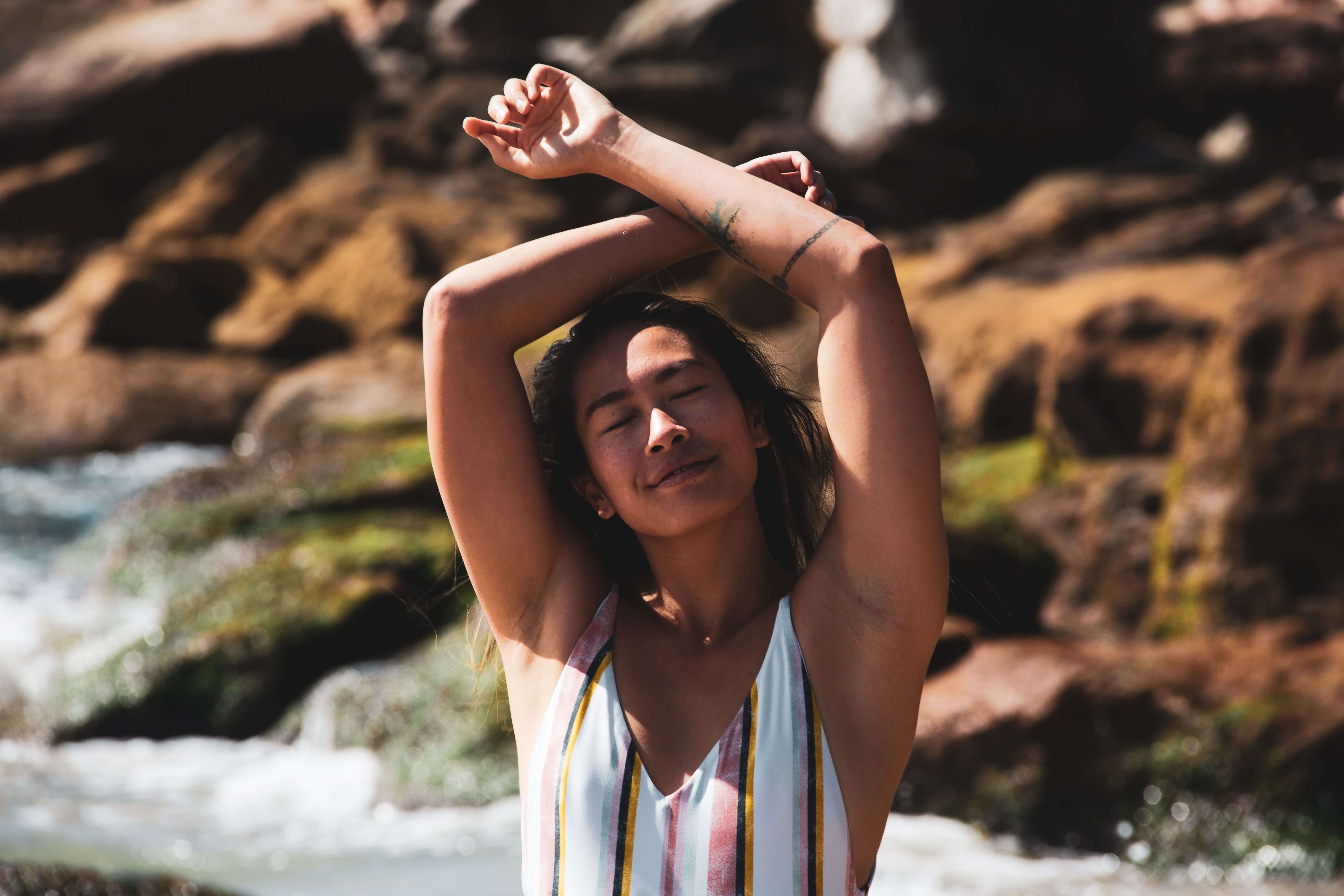 woman arms up