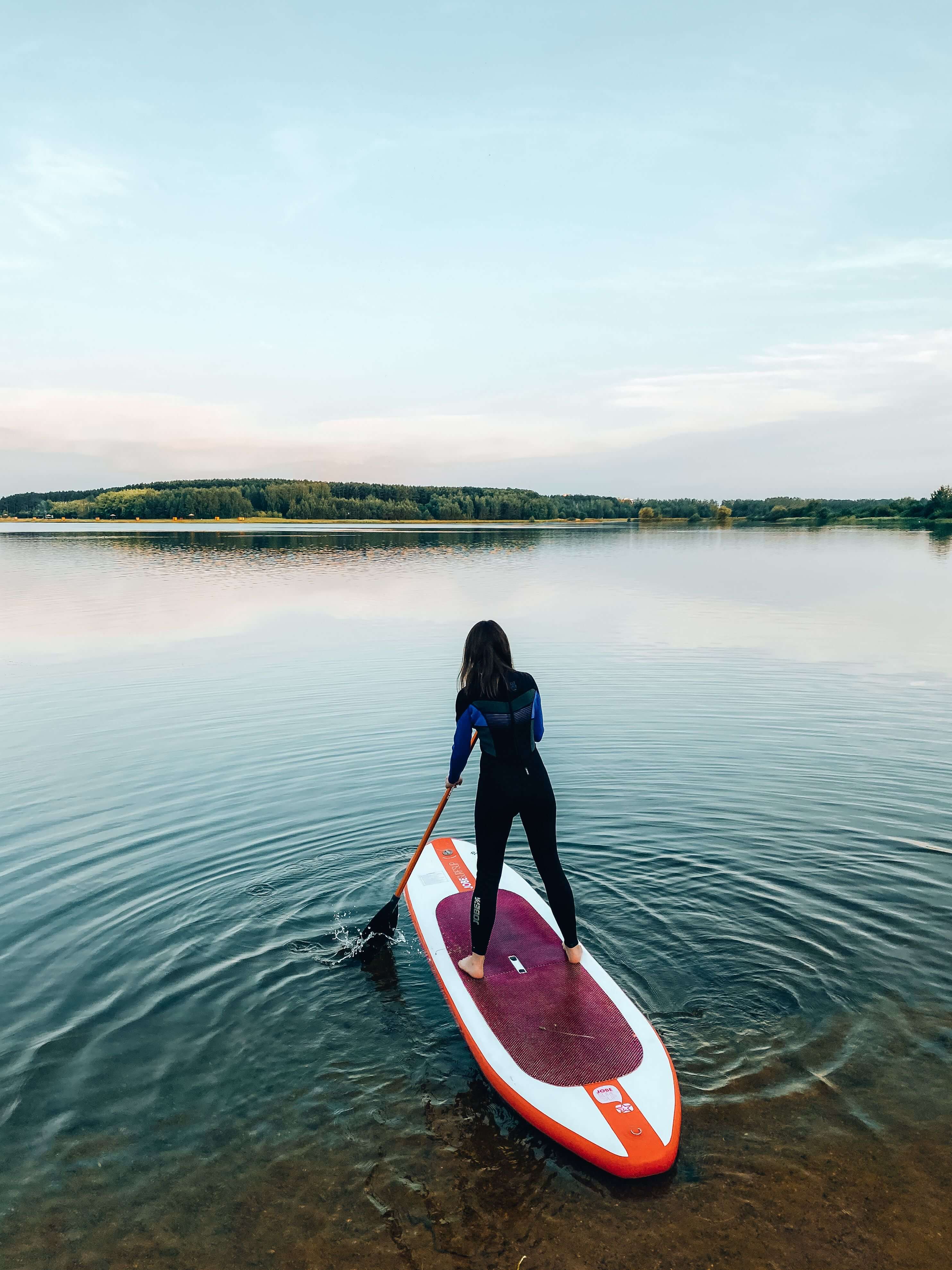 woman paddle boarding