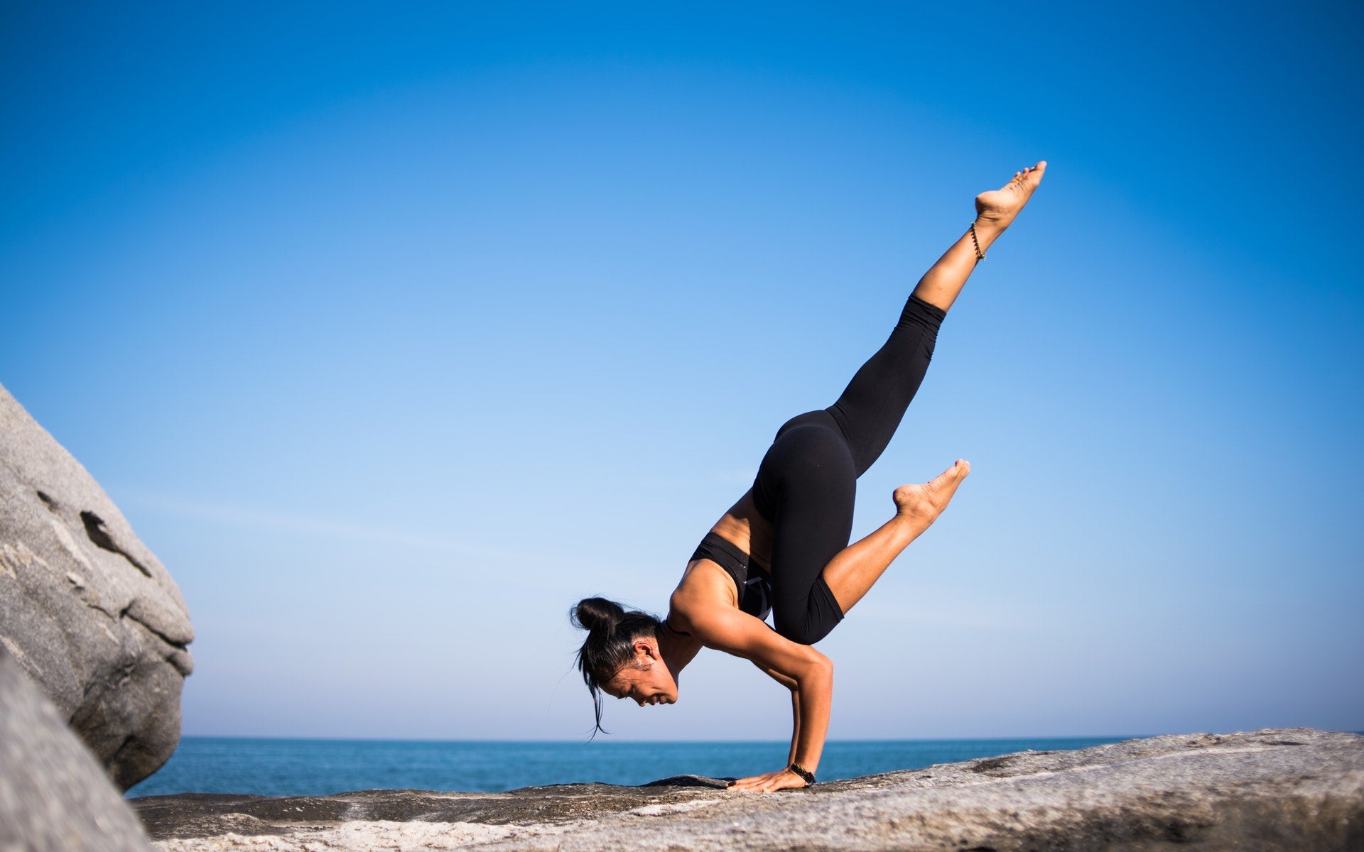 women doing yoga with repair barrier cream bedrock balm