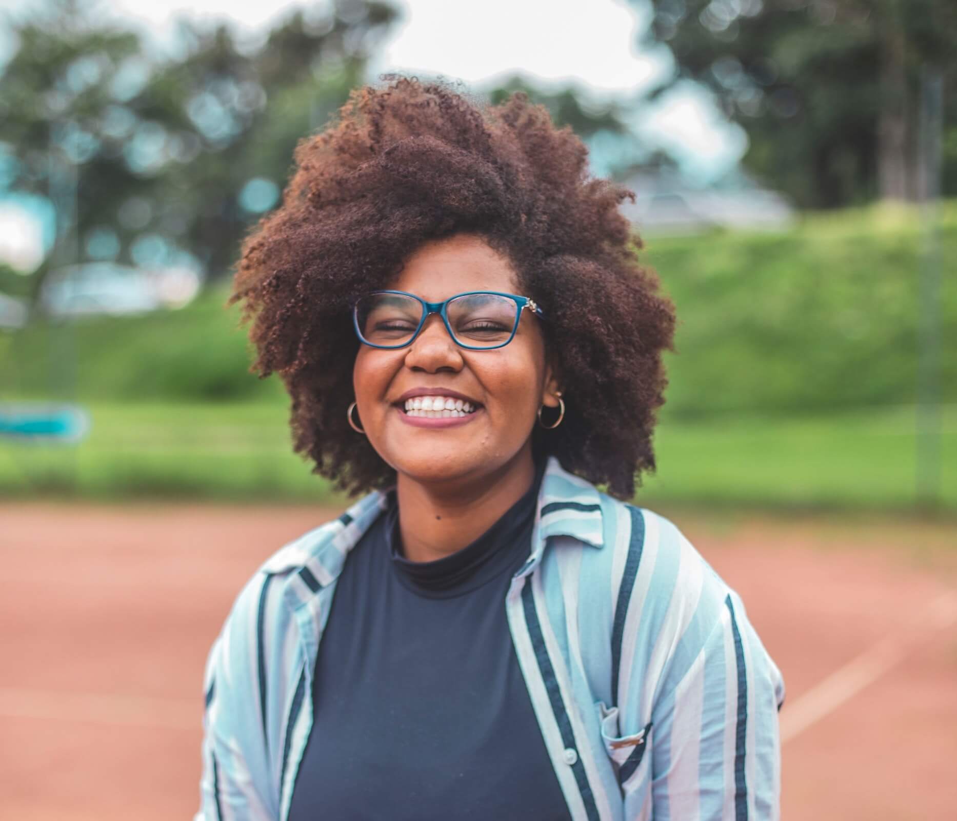 woman smiling outside