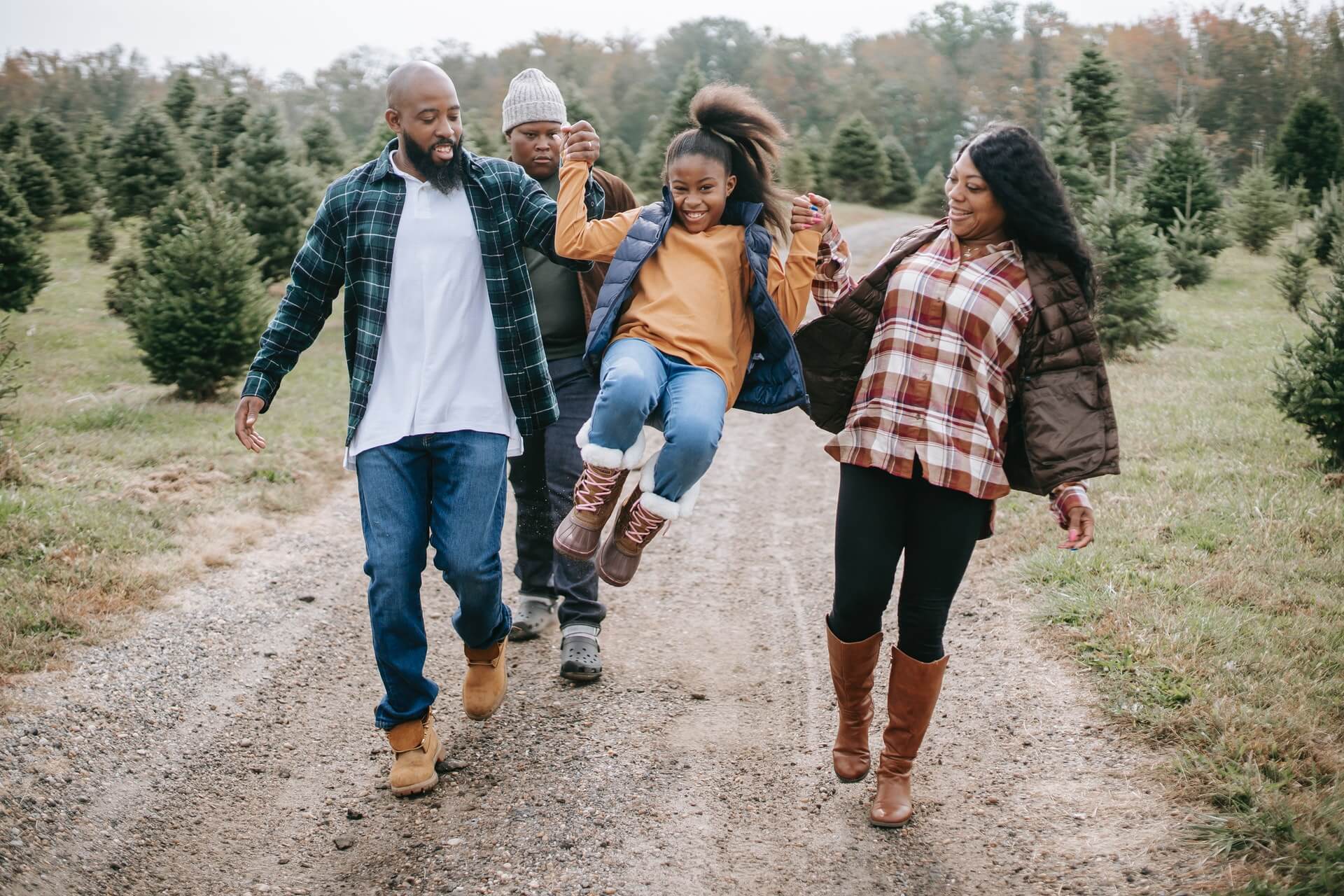 family at christmas tree farm