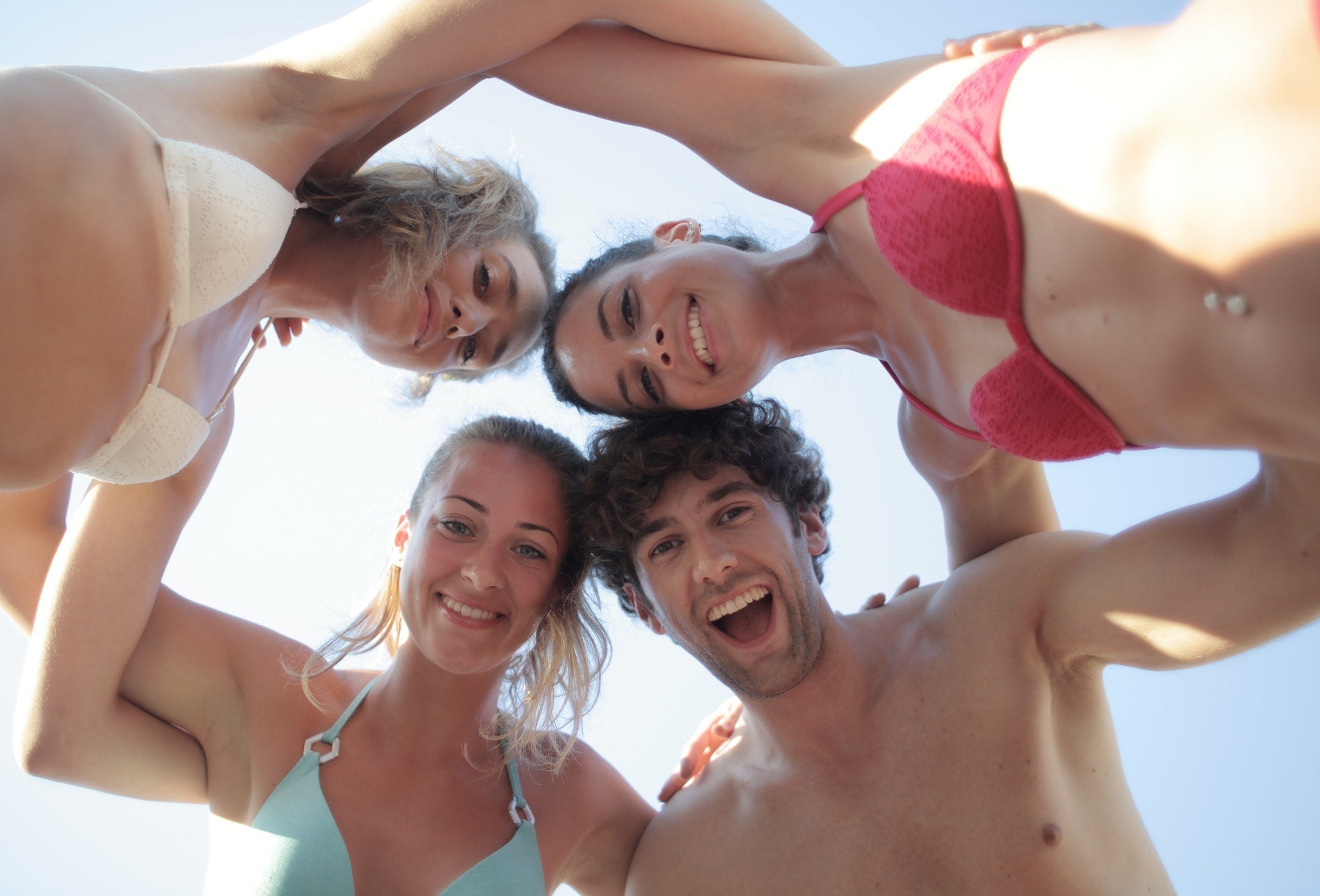 teens having fun on the beach with freshstick