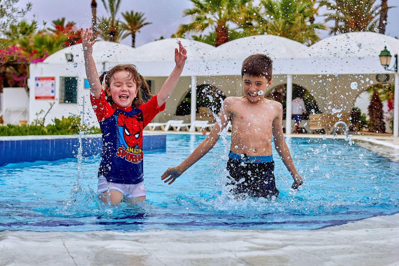 kids playing at the pool
