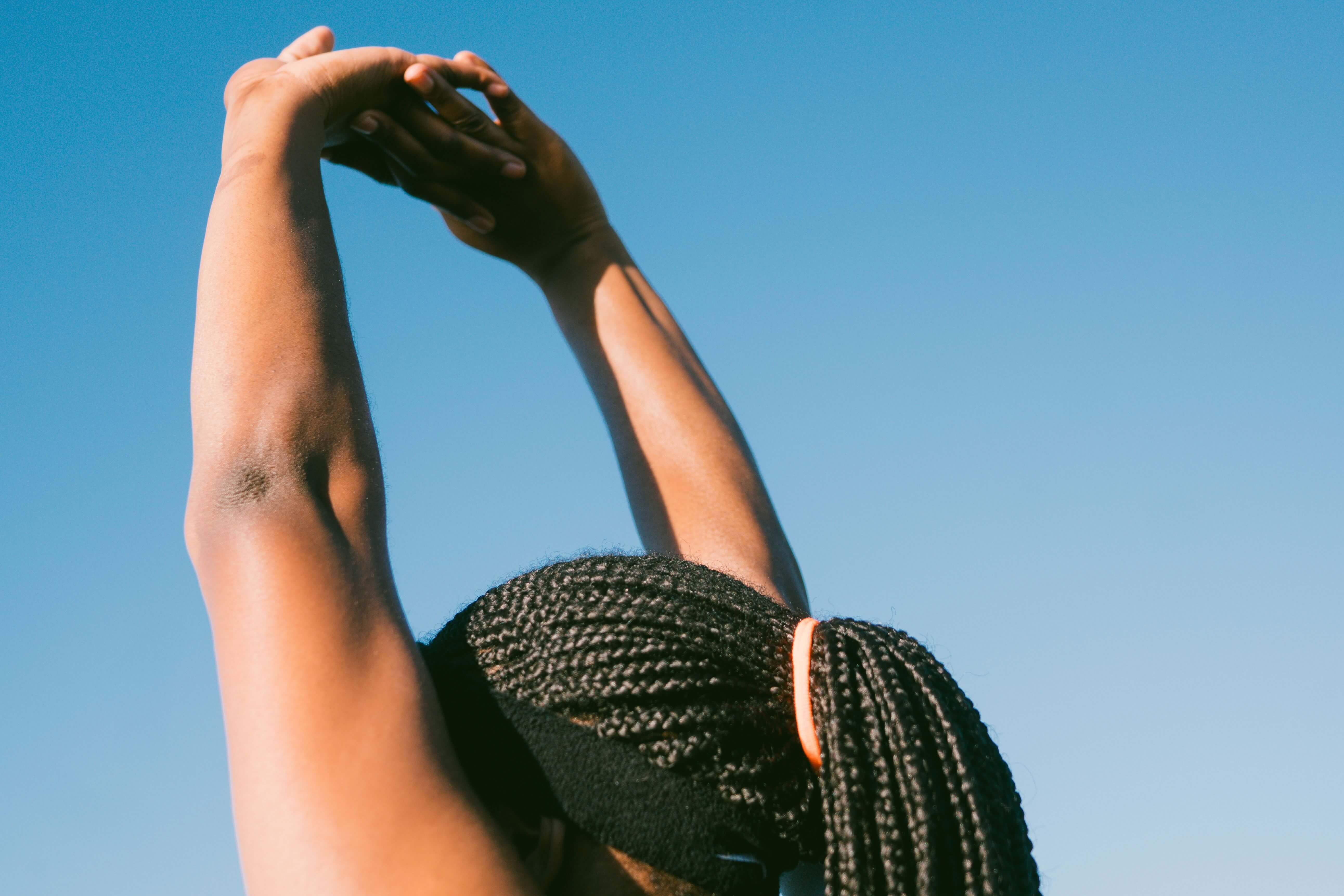 woman with arms up in arm - softer armpits with Freshstick deodorant