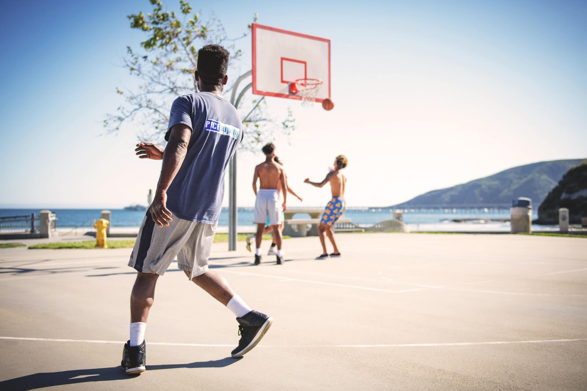 boys playing basketball